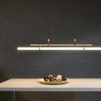 Nilsson – Dimmable Modern LED Pendant Light with Long Tube Design for Dining Tables and Bars Kozyled.com