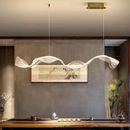 Erik – Dimmable Nordic LED Pendant Light with Creative Long Wave Design for Dining Tables and Bars Kozyled.com